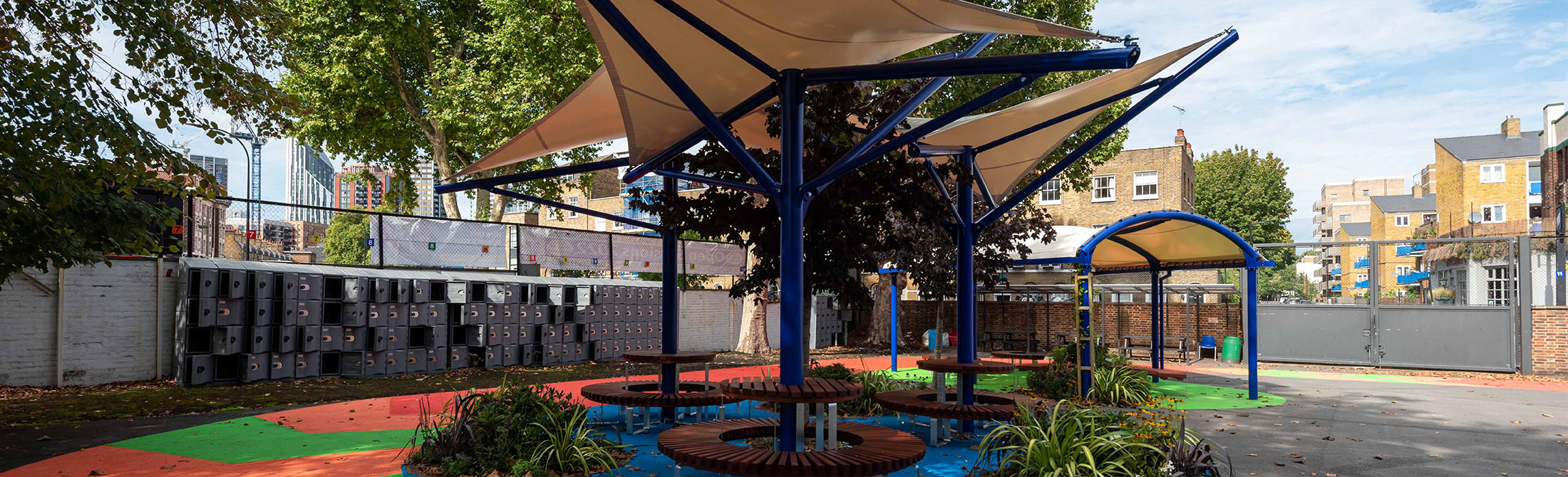 Three tensile fabric canopies on school playground