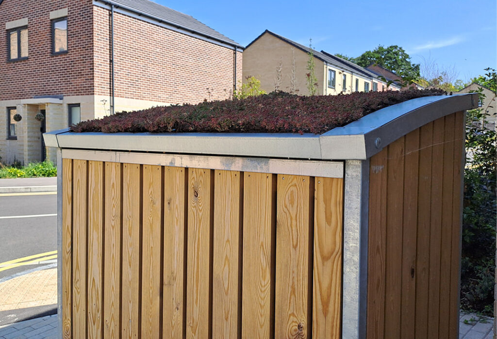 Wheelie bin store with green roof